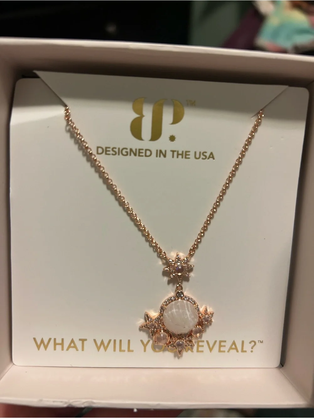 Rose Gold Starburst Pendant Necklace with Mother-of-Pearl Accent